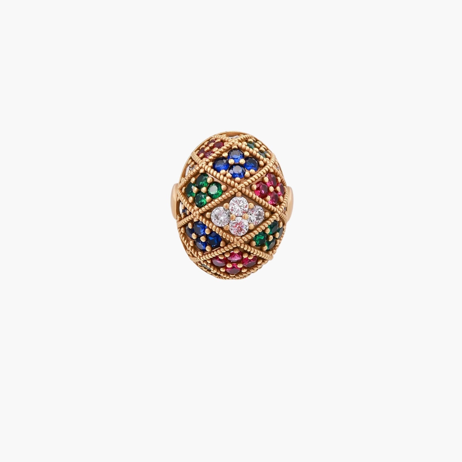 Oversized gold ring with geometric mosaic pattern featuring multicolor zirconia stones in ruby, emerald, sapphire, and clear tones.