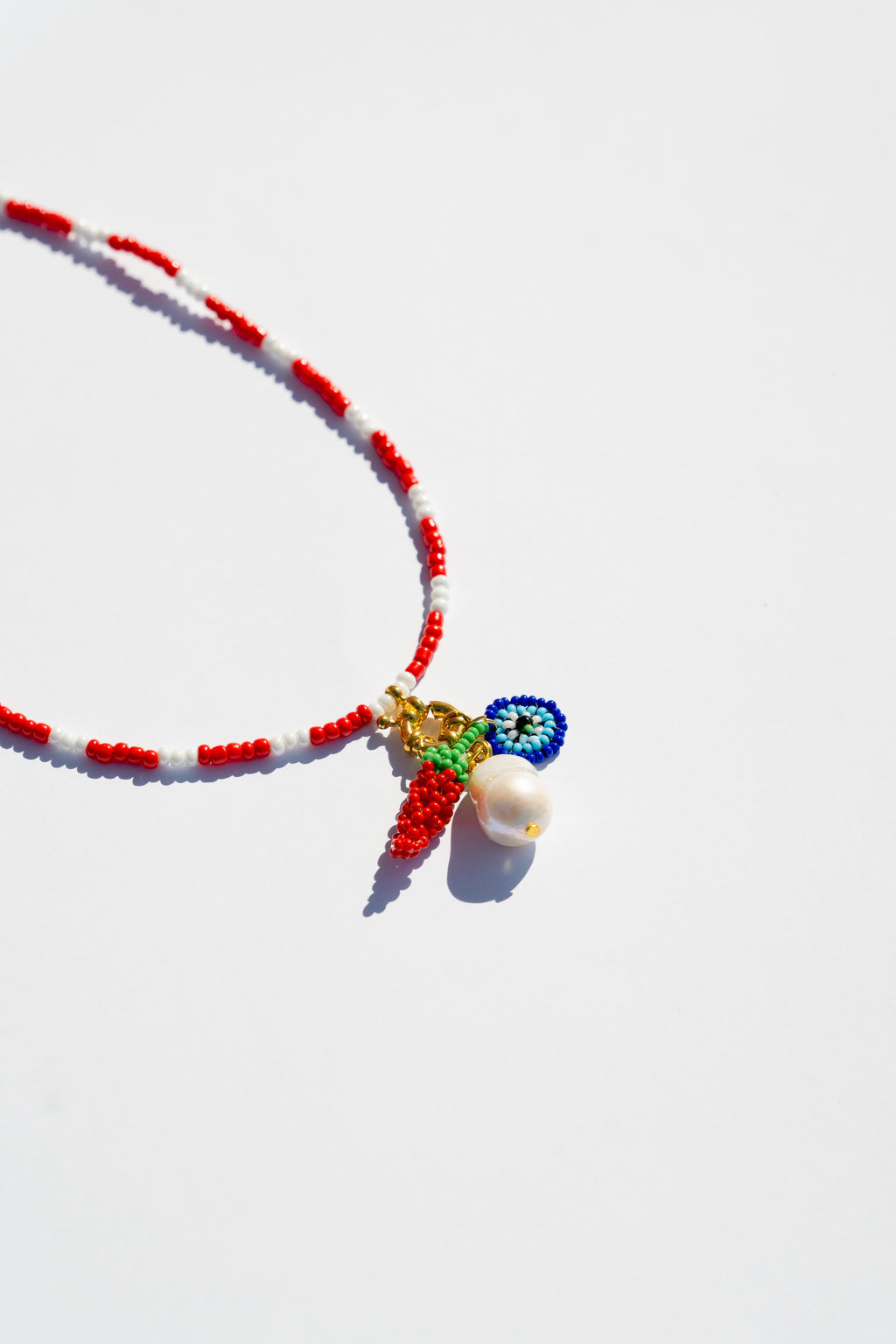 Collar amuleto pica