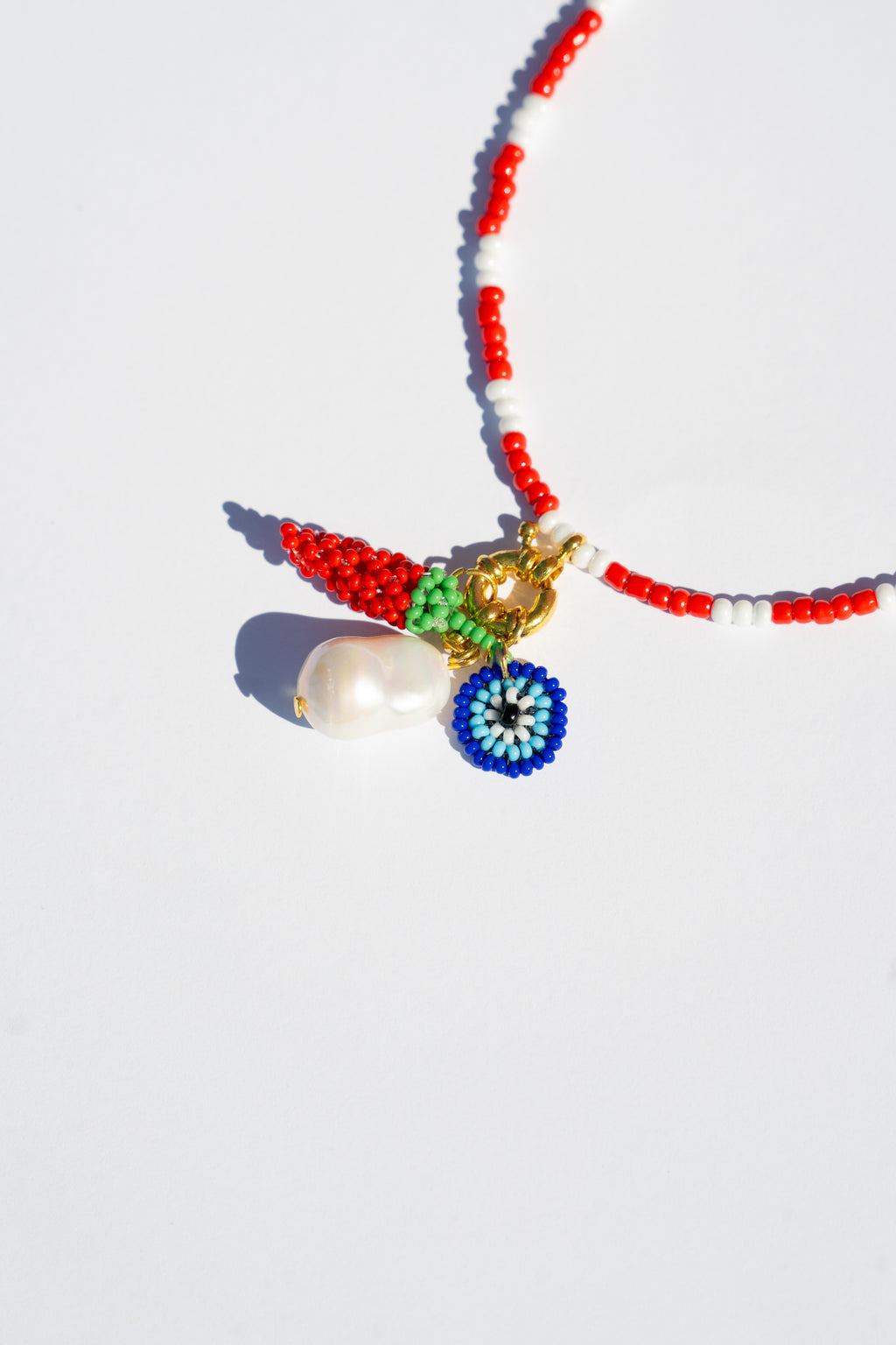 Collar amuleto pica